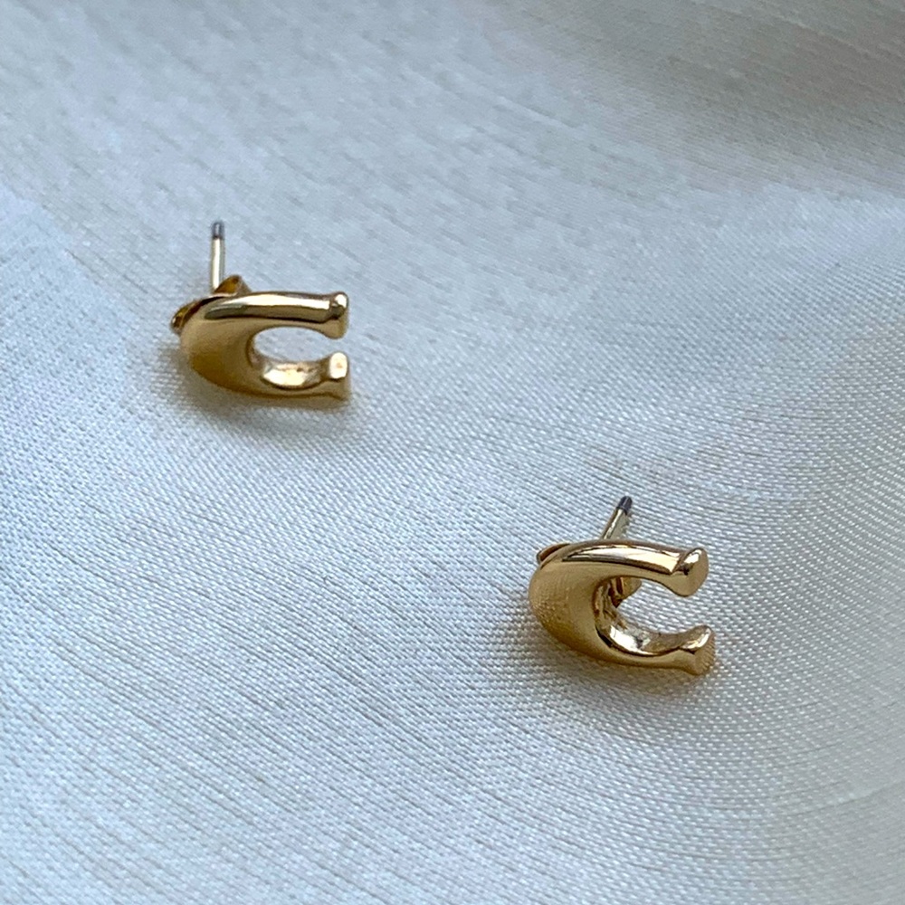 Coach gold signature stud earrings